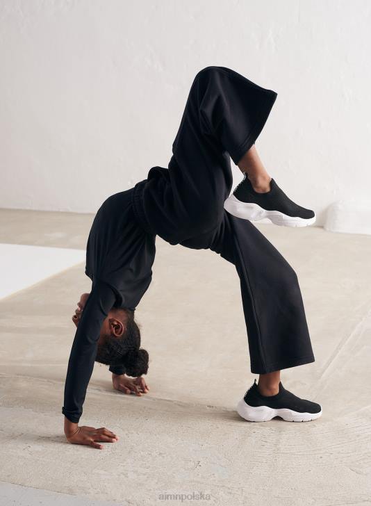 odzież JF4L693 Dzieci AIM'N czarne, mini spodnie dresowe o prostym kroju