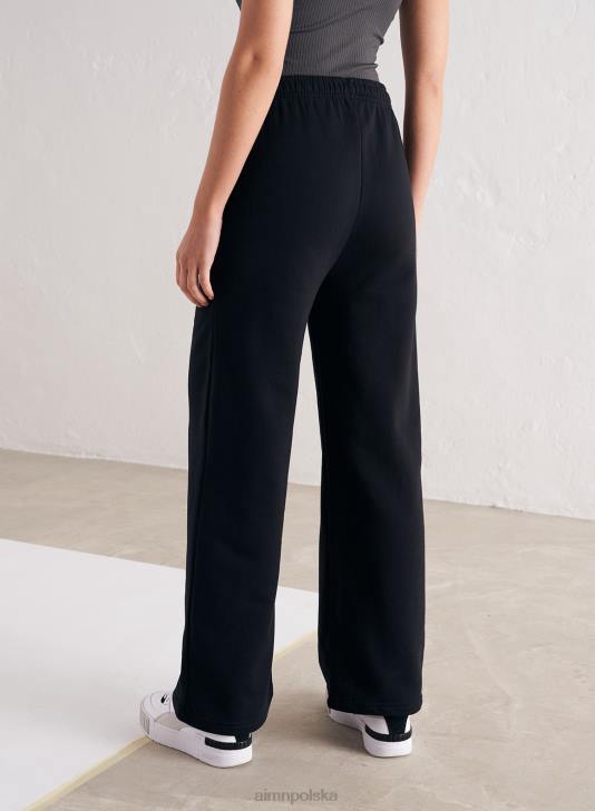 odzież JF4L671 kobiety AIM'N Czarne, proste spodnie dresowe z logo